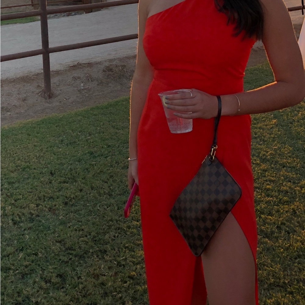 Red/orange off the should dress with slit